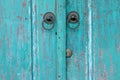 Blue old rustic wooden door with lock. Royalty Free Stock Photo