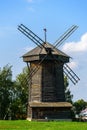 Old wooden rustic windmill