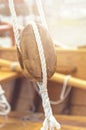 Old wooden sailboat pulleys and ropes detail. Royalty Free Stock Photo