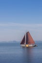 Old wooden sailing boat on the Ijsselmeer near Hoorn