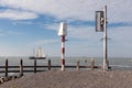 Old wooden sailing ship seen from port pier of Urk, The Netherlands