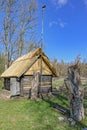 Old wooden sauna log cabin with thatched roof. Hiiumaa island, E Royalty Free Stock Photo