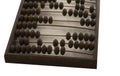 Old wooden scores. close-up abacus . Abacus on light and brown background. Concept of savings, counting. Accounting and Budget Royalty Free Stock Photo