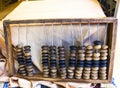 Old wooden scores. Hand on abacus . counter. retro calculator Royalty Free Stock Photo