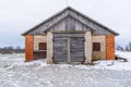 Old Wooden Shed Doors Exterior on White Brick Wall Royalty Free Stock Photo