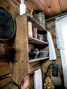 old wooden shelf with rustic kitchen utensils Royalty Free Stock Photo