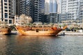 Old wooden ship, Dhow cruise in Dubai Marina Dubai, United Arab Emirates. boat trip on a yacht. Royalty Free Stock Photo