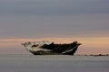 Old wooden ship on Palippi beach at Majene Indonesia