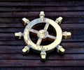 The Old wooden ship wheel Royalty Free Stock Photo