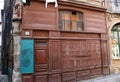 Old wooden shop-front and Black Madonna with Child in Le-Puy-en-Velay, France Royalty Free Stock Photo