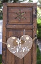 Old wooden shutter windows with hanging heart for Mrs