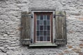 Old Wooden Shuttered Window with colorful panes, Braubach, Germany