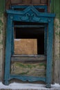 Old wooden shutters on the windows, carved platbands Royalty Free Stock Photo