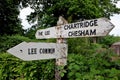 Old wooden signpost with directions to The Lee, Lee Common and Chartridge and Chesham