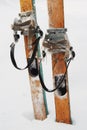 Old wooden skis in the snow