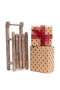 Old wooden sledge with gift Royalty Free Stock Photo