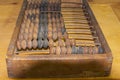 Old wooden Soviet retro abacus. Ancient wooden bills with round beads