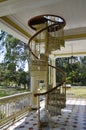 Old wooden spiral staircase connecting the floors