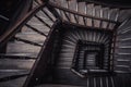 Old wooden spiral staircase without people top view. Vintage Indoor steps. golden ratio Royalty Free Stock Photo