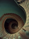 Old wooden spiral stairs in palace Royalty Free Stock Photo