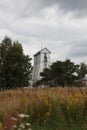 Old wooden square pyramidal front lighthouse in the village Suurupi in Estonia. Suurupi Range Front Lighthouse is built in 1859.