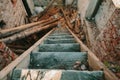 Old wooden staircase descending down.