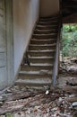 Old wooden staircase and dirty floor