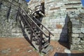 Old wooden staircase outside a stone castle Royalty Free Stock Photo