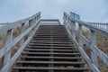 Old wooden stairway to the sky Royalty Free Stock Photo