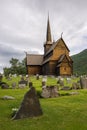 Wooden stave church with a graveyard in Lom, Norway