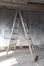 An old wooden 8` stepladder