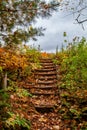 Old wooden steps on a foot path in Lake of the Falls County Park in Mercer, Wisconsin Royalty Free Stock Photo
