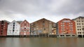 Old Wooden Storehouses Beside the Nidelva River in Trondheim, Norway Royalty Free Stock Photo