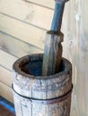 An old wooden stupa with a wooden pestle in it Royalty Free Stock Photo
