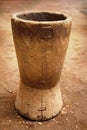 An old wooden stupa with a wooden pestle in it Royalty Free Stock Photo