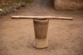 An old wooden stupa with a wooden pestle in it Royalty Free Stock Photo