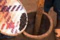 An old wooden stupa with a wooden pestle in it Royalty Free Stock Photo