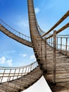 Old wooden suspended bridges against blue sky. 3D illustration