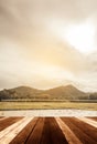 old wooden table with blur image of lake sky. Royalty Free Stock Photo