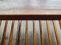 Old wooden table with the brown background