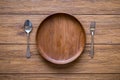 old wooden table with empty plate on a wooden table and copyspace Royalty Free Stock Photo