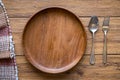 old wooden table with empty plate on a wooden table and copyspace Royalty Free Stock Photo