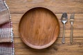 old wooden table with empty plate on a wooden table and copyspace Royalty Free Stock Photo