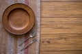 old wooden table with empty plate on a wooden table and copyspace Royalty Free Stock Photo