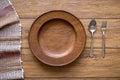 old wooden table with empty plate on a wooden table and copyspace Royalty Free Stock Photo