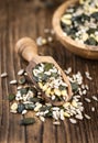 Old wooden table with mixed Seeds (selective focus) Royalty Free Stock Photo