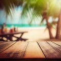 Old wooden table top on blurred beach background with coconut palm leaf. Concept Vacation, Summer, Beach, Sea Royalty Free Stock Photo