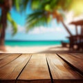 Old wooden table top on blurred beach background with coconut palm leaf. Concept Vacation, Summer, Beach, Sea Royalty Free Stock Photo