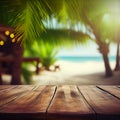 Old wooden table top on blurred beach background with coconut palm leaf. Concept Vacation, Summer, Beach, Sea Royalty Free Stock Photo