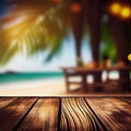 Old wooden table top on blurred beach background with coconut palm leaf. Concept Vacation, Summer, Beach, Sea Royalty Free Stock Photo